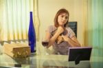 Young Woman In Depression, Drinking Alcohol Stock Photo