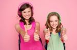 Teen Girls Showing Thumbs Up Stock Photo