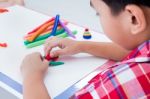 Child Moulding Whale Modeling Clay, On White Background. Strengthen The Imagination Of Child Stock Photo