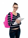 College Student Holding Notebook Stock Photo