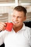 Handsome Guy Enjoying Coffee Stock Photo