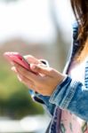 Mobile Phone In A Woman's Hand. Outdoor Image Stock Photo