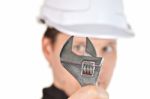 Handyman Wearing Uniform And Hardhat Stock Photo