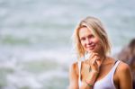 Beautiful Young Blonde Woman Posing Outdoor At The Rocky Sea Sho Stock Photo