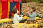 Children Play In The Park And Eating Apple Stock Photo