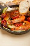 Roasted Shrimps With Zucchini And Tomatoes Stock Photo