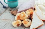 Bread And Coffee Cup On Wooden Stock Photo