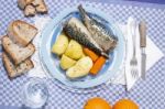 Mackerel Fish With Potato And Carrot Stock Photo