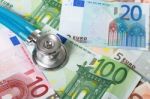 Stethoscope And Euro Money Stock Photo