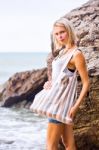 Beautiful Young Blonde Woman Posing Outdoor At The Rocky Sea Sho Stock Photo