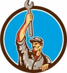 Mechanic Raising Up Spanner Circle Retro Stock Photo