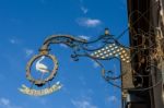 Hanging Sign In Riquewihr In Haut-rhin Alsace France Stock Photo