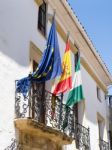 Ronda, Andalucia/spain - May 8 : Flags On A Building In Ronda Sp Stock Photo