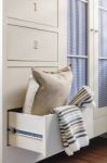 Bath Towel And Pillow In Wardrobe Stock Photo