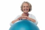 Senior Woman Posing With Exercise Ball Stock Photo