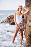 Beautiful Young Blonde Woman Posing Outdoor At The Rocky Sea Sho Stock Photo