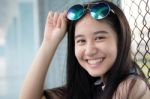 Portrait Of Thai Teen Glasses Beautiful Girl Relax And Smile Stock Photo