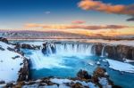 Godafoss Waterfall At Sunset In Winter, Iceland Stock Photo