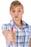 Young Women Showing The Toothbrush Stock Photo