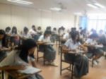 Blur Background University Students Writing Answer Doing Exam In Stock Photo