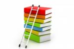 Ladder On Stacked Hardcover Books Stock Photo