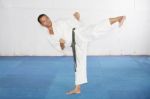 Man Practicing Martial Arts At The Gym Stock Photo