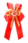 Red Bow And Artificial Flower Stock Photo