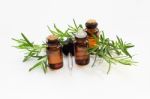 Rosemary Essential Oil On White Stock Photo