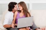 Romantic Couple With Laptop Stock Photo