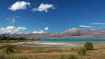 Distant View Of Lake Tekapo On A Summer's Day Stock Photo