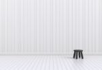 Black Chair In A White Room Stock Photo