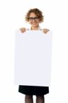 Aged lady showing Blank White card Stock Photo