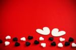 White Hearts On Red Background Stock Photo