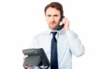 Business Professional Attending Call Stock Photo