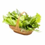 Herbs In A Braided Wooden Basket On White Background With The In Stock Photo