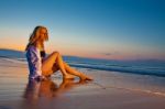 Blonde Girl On The Beach Stock Photo