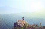 Instagram Filter Young Man Asia Tourist At Mountain Is Watching Over The Misty And Foggy Morning Sunrise, Travel Trekking Stock Photo