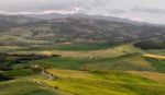 Pienza, Tuscany/italy - May 19 : Farmland Below Pienza In Tuscan Stock Photo