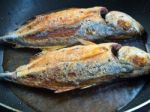 Sea Fish Frying In A Pan Stock Photo