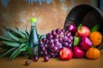 Fresh Fruits On A Wooden Table Stock Photo