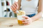 Beautiful Young Woman Enjoying Breakfast At Home Stock Photo