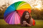 Happy Fatty Woman With Umbrella Stock Photo