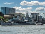 Hms Belfast Anchored Near Tower Bridge Stock Photo