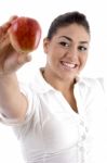 Smiling Young Female Showing Apple Stock Photo