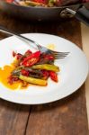 Fried Chili Pepper And Vegetable On A Wok Pan Stock Photo