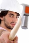 Architect Showing Hammer Stock Photo