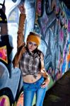 Pretty Young Girl And Graffiti Stock Photo