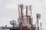 Satellite Damaged And Antenna On The Old Building Stock Photo