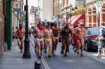 London - July 27 : Friends Jogging Through The Streets Of London Stock Photo