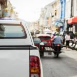 Cars On The Road In The Old Town, Phuket, Thailand Stock Photo